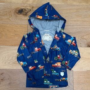 Hatley Navy Kids' Hooded Raincoat with Colorful Truck Print